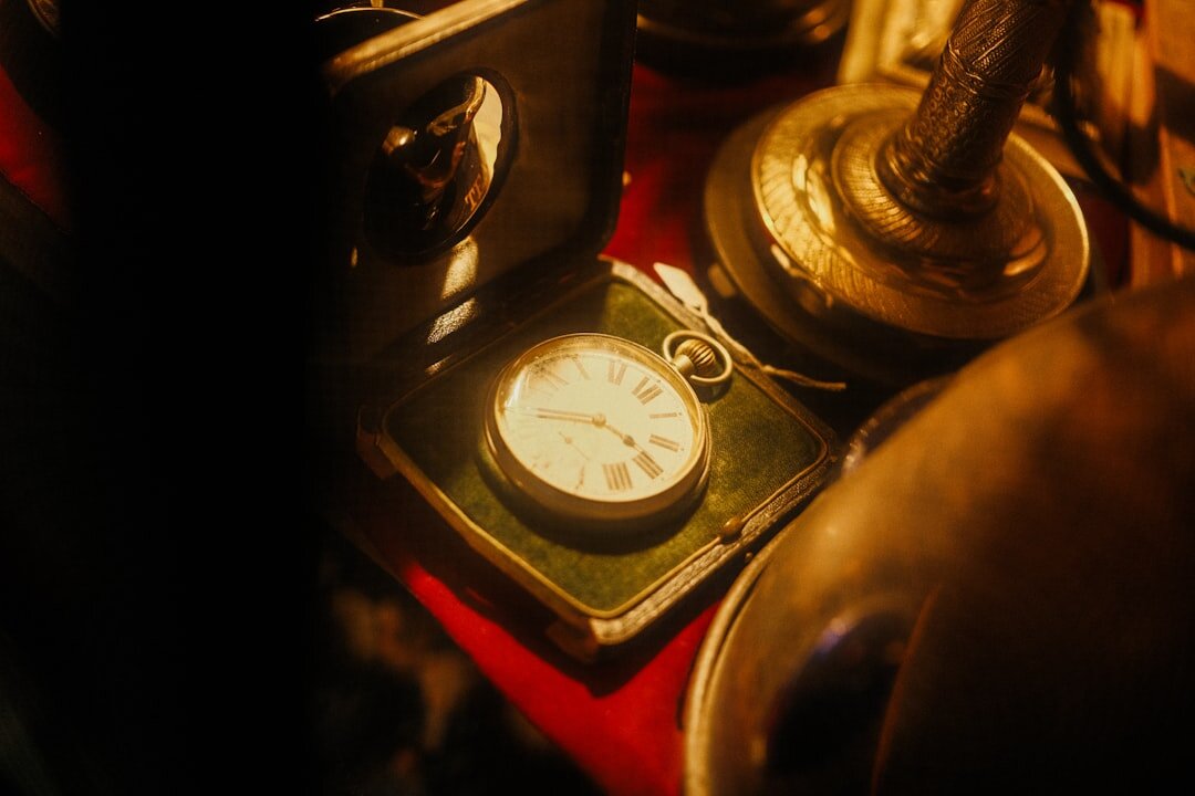Close-up of an antique brass pocket watch
