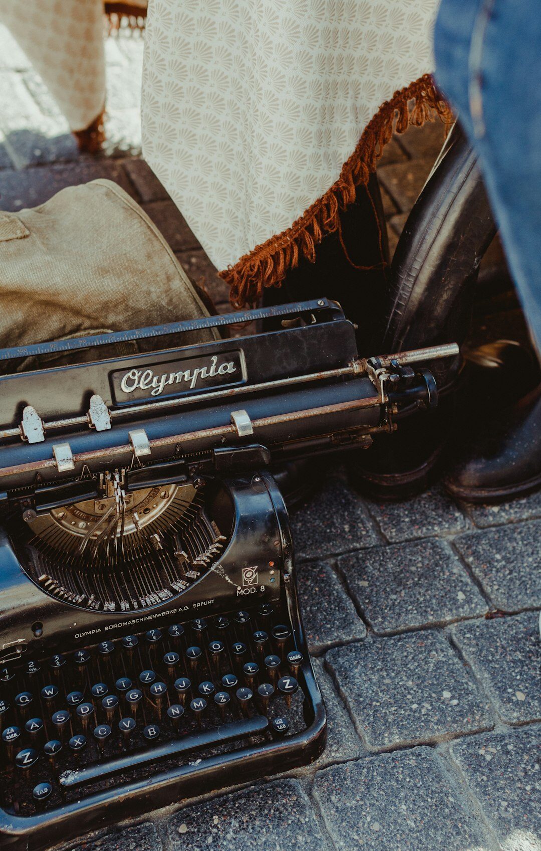 writer typing on old typewriter